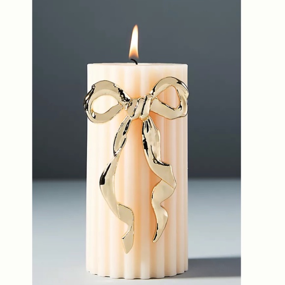 ANTHROPOLOGIE Other - NWT Anthropologie Bow Candle Charm